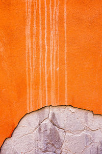 Close-up of orange weathered wall