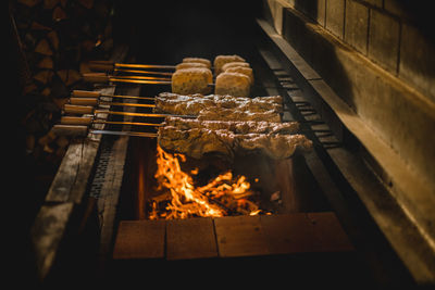 High angle view of fire on barbecue grill