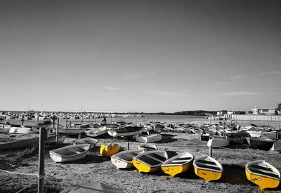Deck chairs against sky