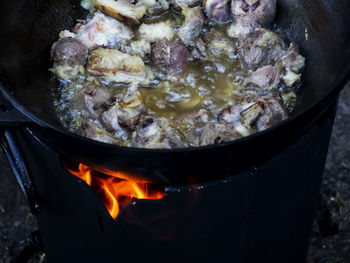 High angle view of meat in cooking pan