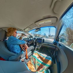 People sitting in car