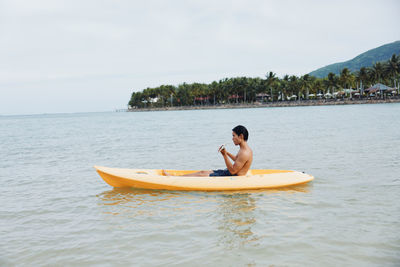 Man swimming in sea