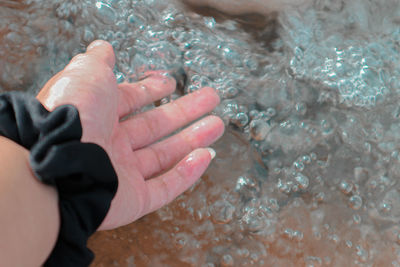 High angle view of people on rock