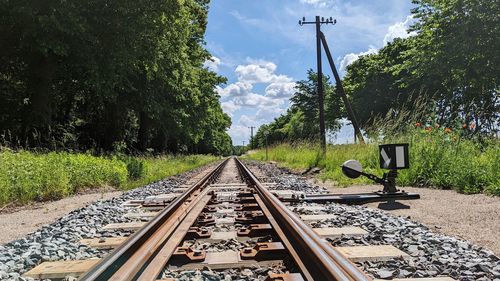 Railroad track against sky