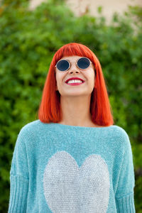 Portrait of smiling young woman