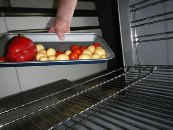 Close-up of man preparing food at home