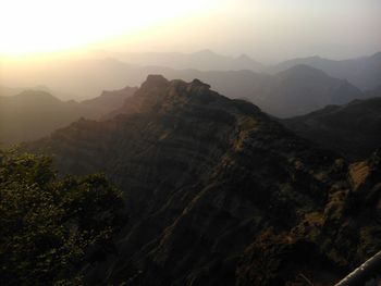 Scenic view of mountains at sunset