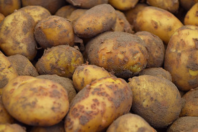 Full frame shot of raw potatoes for sale in market