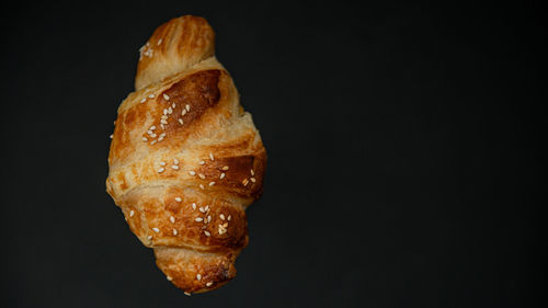 High angle view of ice cream against black background