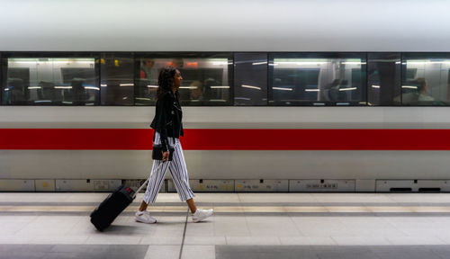 Blurred motion of train at railroad station