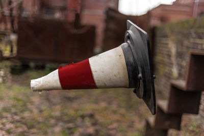 Close-up of coin-operated binoculars on wood