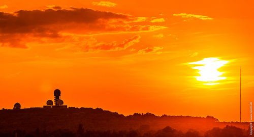 Scenic view of silhouette mountain against sky during sunset