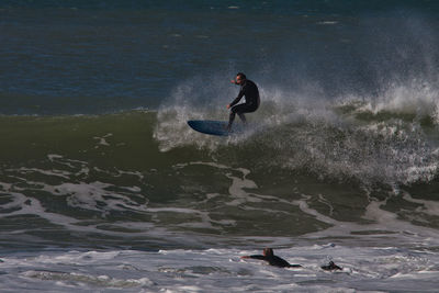 Man surfing in sea