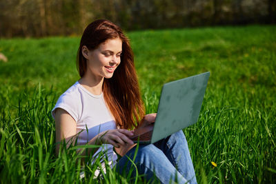 Young woman using digital tablet