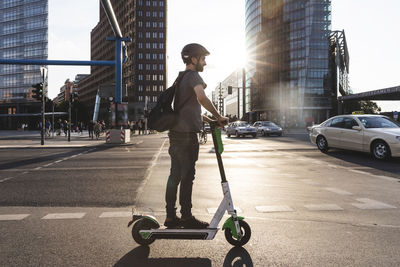 Man using e-scooter in berlin, germany