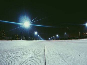 Illuminated street lights at night