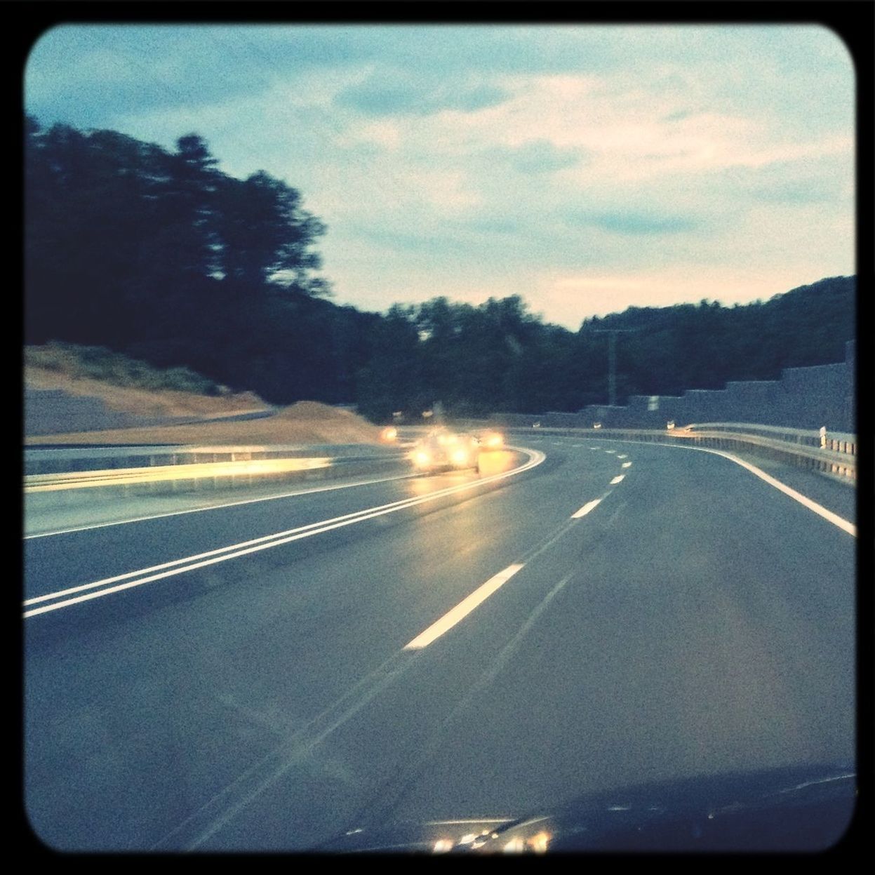 transportation, road, road marking, the way forward, transfer print, sky, diminishing perspective, vanishing point, auto post production filter, highway, car, mode of transport, country road, cloud - sky, travel, asphalt, on the move, street, dividing line, car point of view