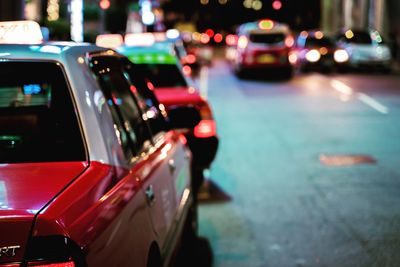 Close-up of traffic on road at night