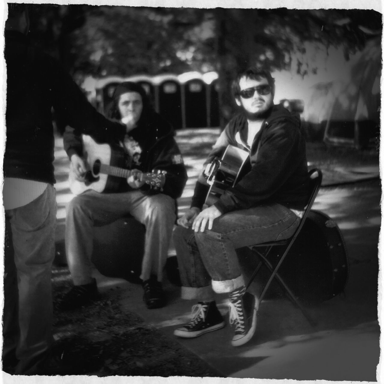 WOMAN SITTING ON CHAIR