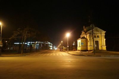 Illuminated street lights at night