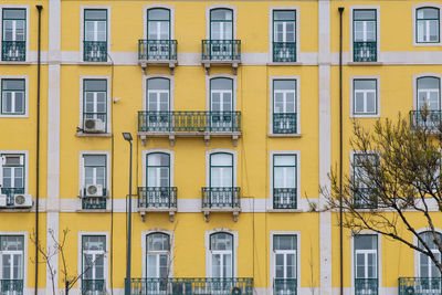 Full frame shot of yellow residential building