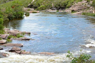 Scenic view of river amidst rocks