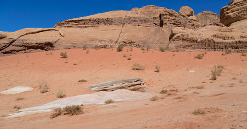 View of rock formations in desert against sky