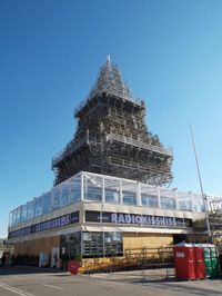 Low angle view of building against blue sky