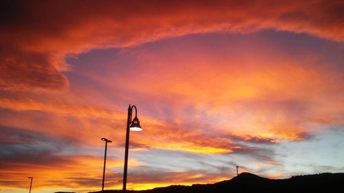 Scenic view of dramatic sky during sunset