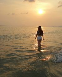 Scenic view of sea at sunset