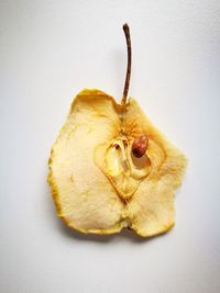 Close-up of lemon against white background