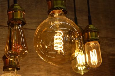 Close-up of illuminated light bulb