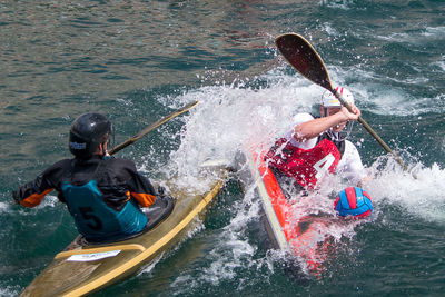 View of people on boat in river