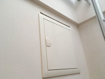 Close-up of white door