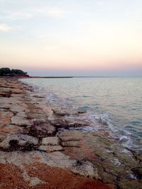 Scenic view of sea at sunset