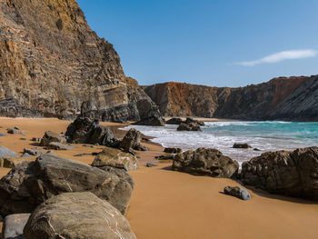 Scenic view of beach against sky