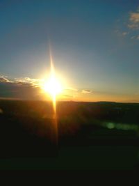 Scenic view of landscape against sky during sunset