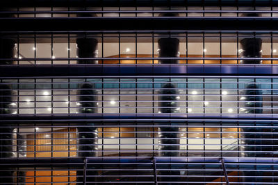Full frame shot of illuminated modern building at night