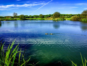 Scenic view of lake against sky