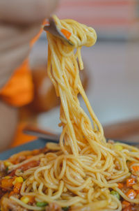 Close-up of noodles in bowl on table