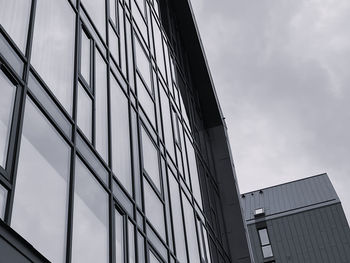 Low angle view of modern building against sky