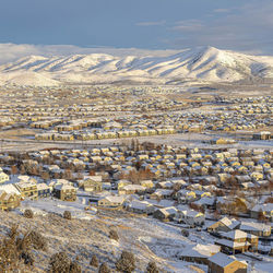 High angle view of snowcapped mountain against sky