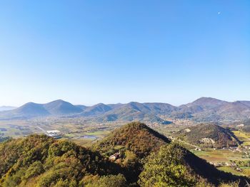 Scenic view of landscape against clear blue sky