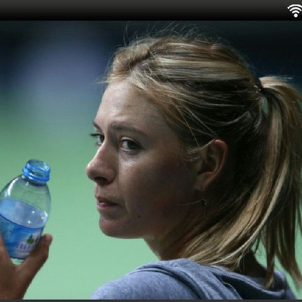 headshot, lifestyles, person, leisure activity, close-up, head and shoulders, refreshment, indoors, drink, focus on foreground, young adult, front view, food and drink, holding, drinking glass, human face, glass - material, transparent