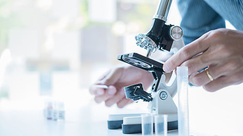 Close-up of man working on table