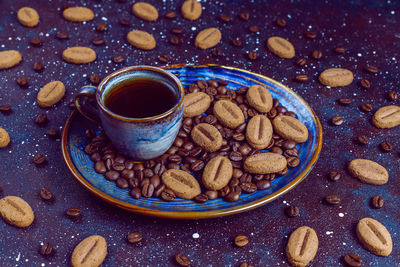 Close-up of coffee beans on table