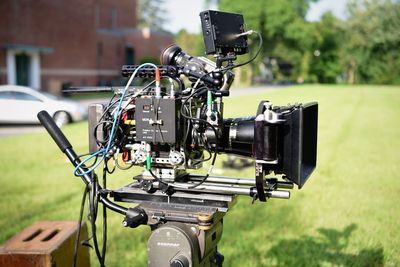 Close-up of camera on field