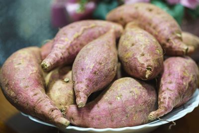 Close-up of carrots for sale at market stall