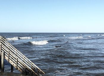 Scenic view of sea against clear sky