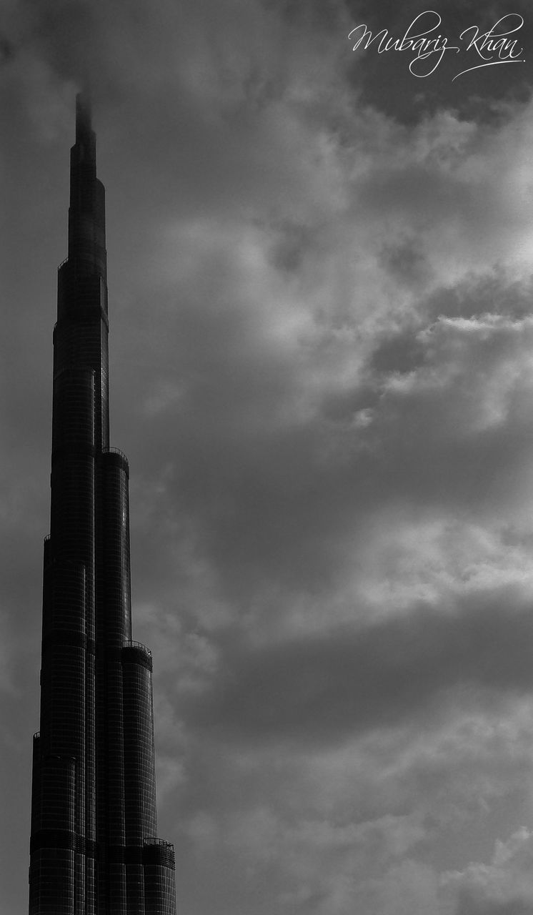 LOW ANGLE VIEW OF CLOUDY SKY OVER BUILDING